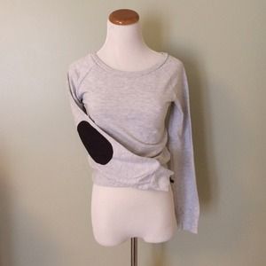 Grey crew neck sweater with brown elbow pads