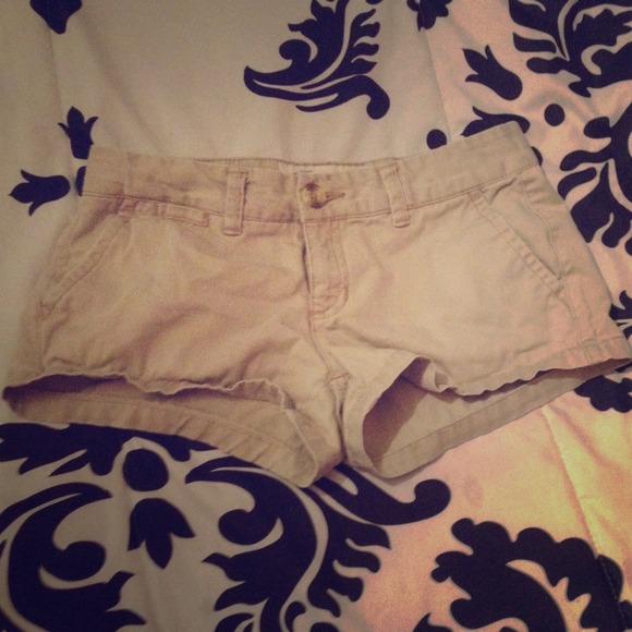 tan short shorts.