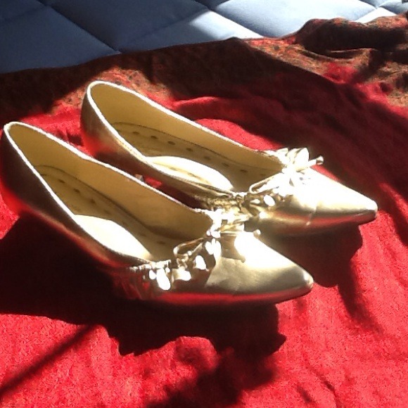 Shoes - Blossom Collection gold pumps with 1 inch heels.