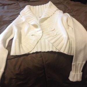 Half sweater. Very cute over tank tops