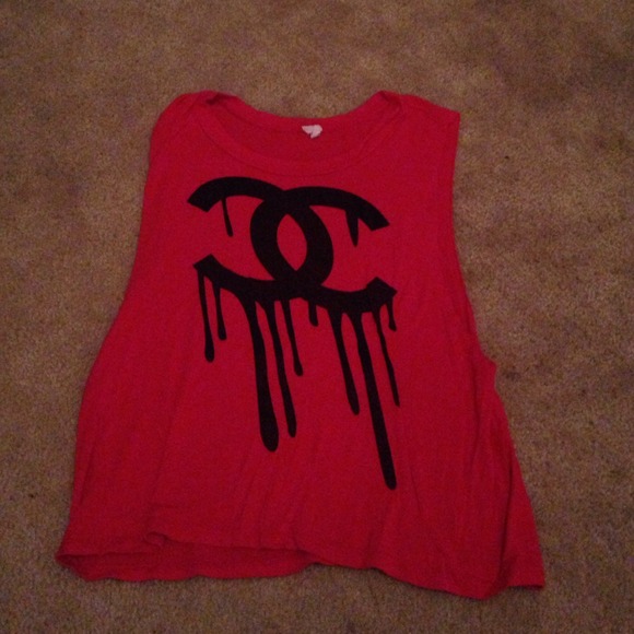 Red cut out tank with dripping Chanel logo