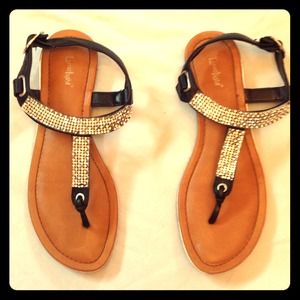 Sparkly black sandals.