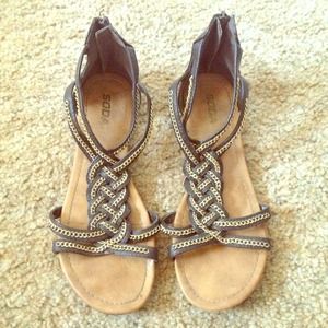 Soda gladiator sandals with back zipper tie up.