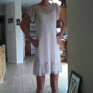 Adorable lace dress, fits sizes 2-6. NWOT.