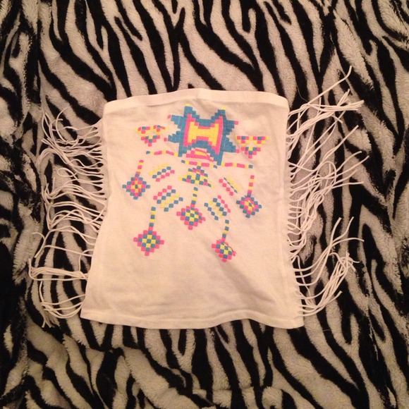 Colorful Aztec designed sleeveless shirt .