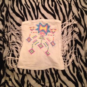 Colorful Aztec designed sleeveless shirt .