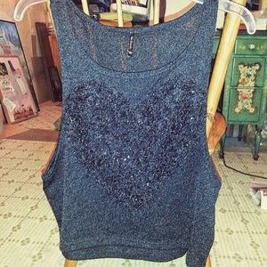 Heart muscle tanktop can be dress up or down