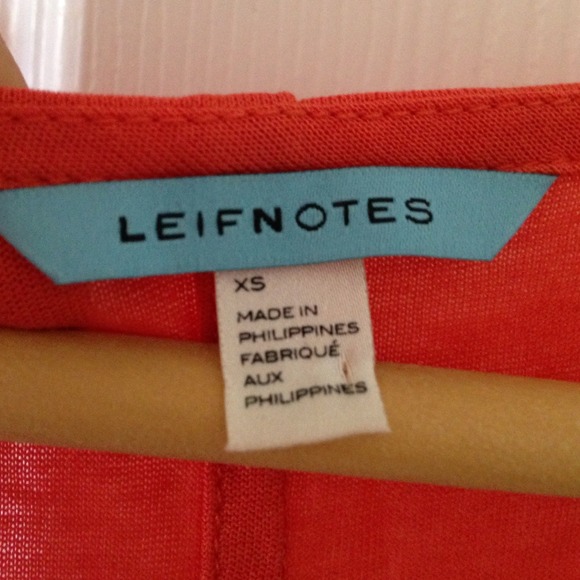 orange top with cutout - Picture 2 of 3