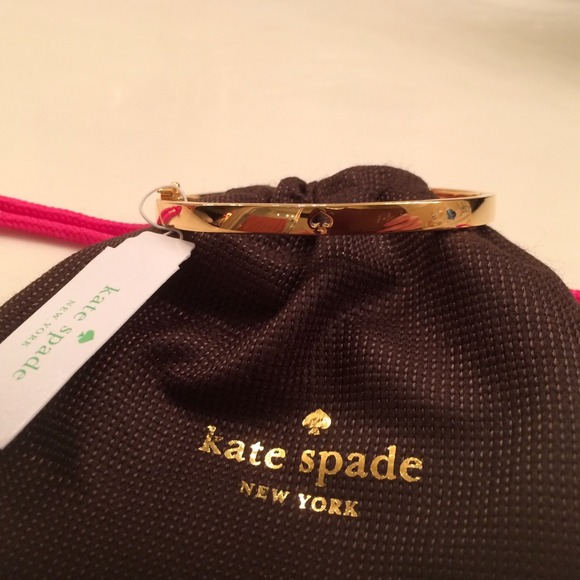 kate spade Jewelry - Kate Spade Gold HL Punch Spade Bangle