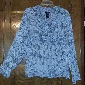 Beautiful long sleeved, floral, sheer blouse