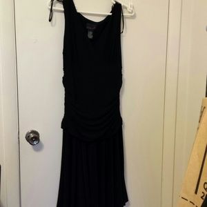 Black sleeveless dress.
