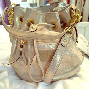Coach Poppy Gold Shimmer Cinch Purse.
