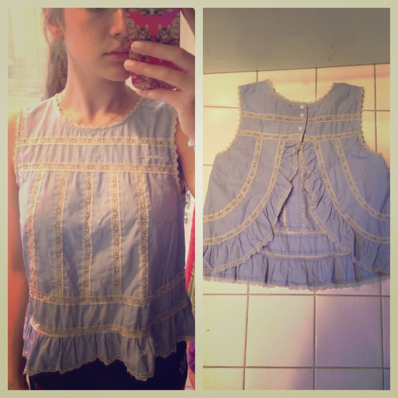 baby blue sleeveless top, open in the back