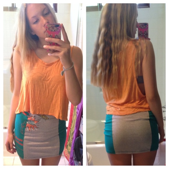 orange sleeveless top & multicolored pencil skirt