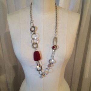Silver statement necklace with red accent