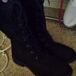 Black combat boots . Suede like . Worn once