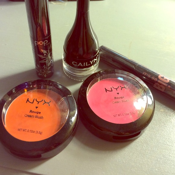 Lot of cream blushes, gel liner, and mascaras