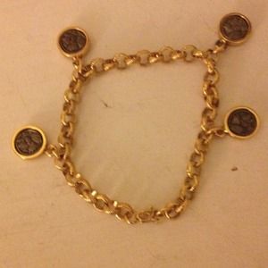 Brass chained bracelet with Native American coins