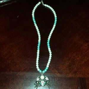 Homemade crab and pearl necklace