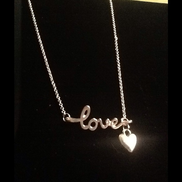 Sterling silver necklace with love/heart charms