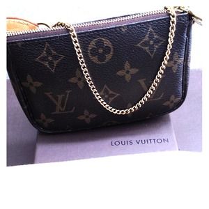 Authentic Louis Vuitton mini Pochette Accessories
