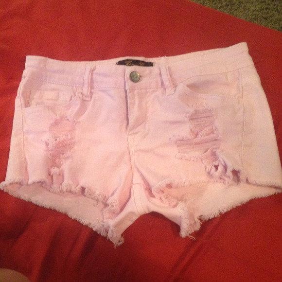 Pink ripped shorts