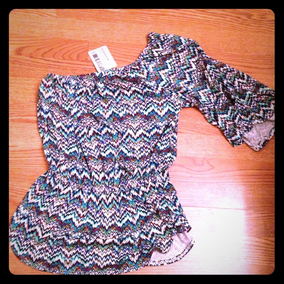 Sexy and versatile one shoulder top. Size xs.