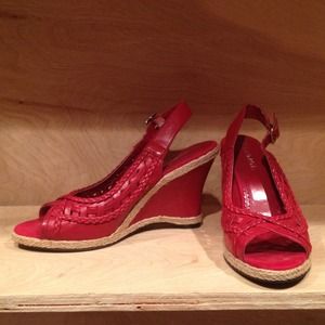 Red platform sandals.