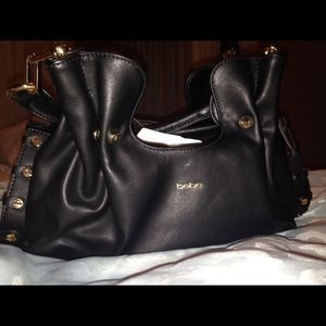 Black and gold Bebe purse