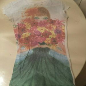 A unique t - shirt perfect for a causal day!