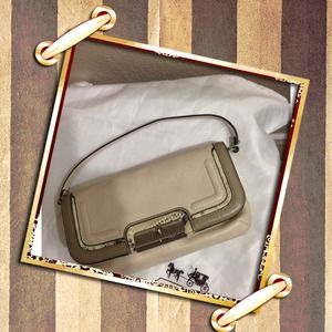 🎉Donated🎉Beautiful Tan Coach Clutch!