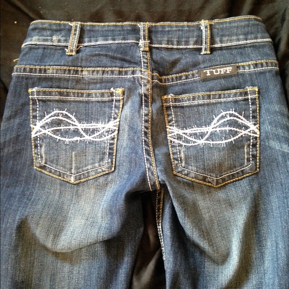 Cowgirl Tuff jeans.