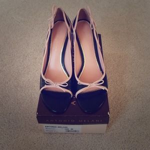 Pink and black leather peep toe shoes