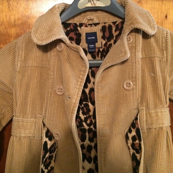 Adorable girls corduroy trench coat holding