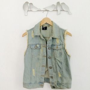 Distressed denim vest