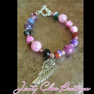 Sold Rose,an wing, gemstones