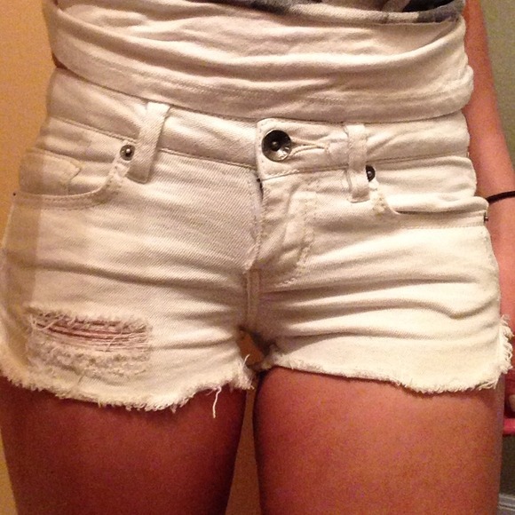 White distressed denim shorts