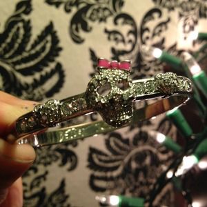 Betsey Johnson silver skull bow bangle