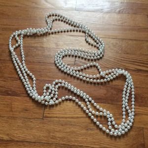 Extra long pearl necklace