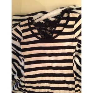 Cream colored shirt with black stripes