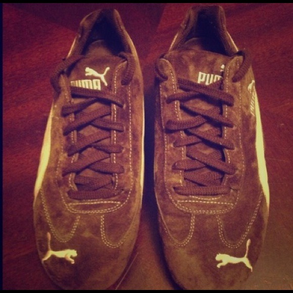 Brown and White Puma shoes