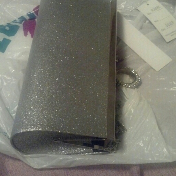 Silver clutch with chain strap👜