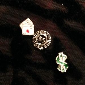 Poker chip, poker cards and $ floating charms
