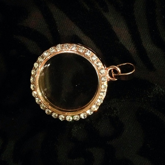 Rose gold tone floating charm locket