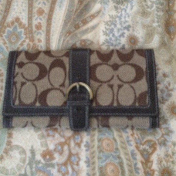 Coach wallet. Brown and in good shape.