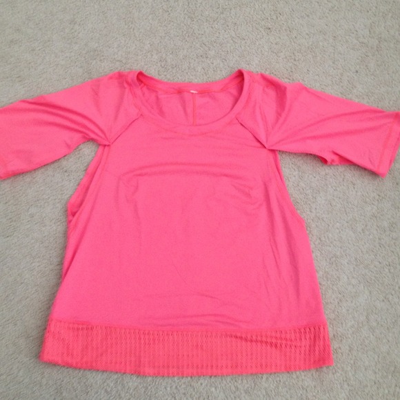 SOLD!!! Cute peach/pink colored lulu work out top