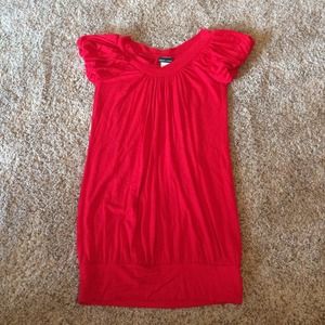 Red dress, fitted on bottom