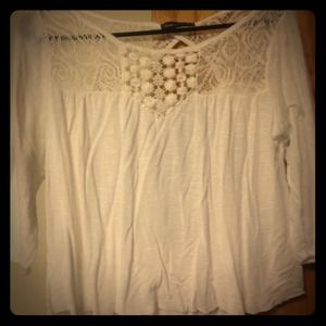 Quarter sleeve top with crochet neckline.