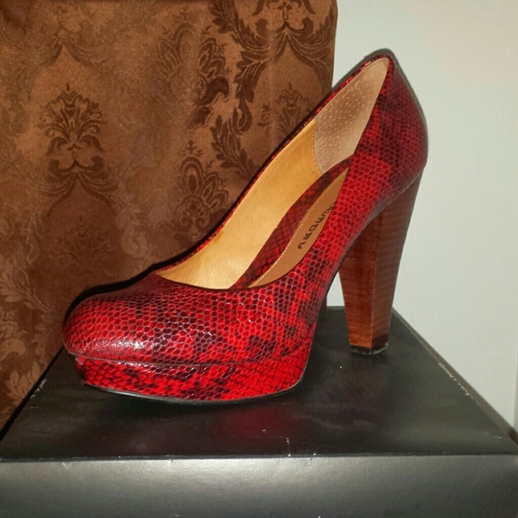 RED HOT!! Snake skin print platform pump. Classy!