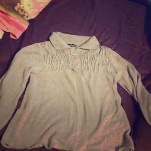 A grey cotton cardigan with quarter length sleeves